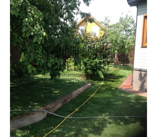 Укладка рулонного газона в деревне Слепушкино - фото - 6